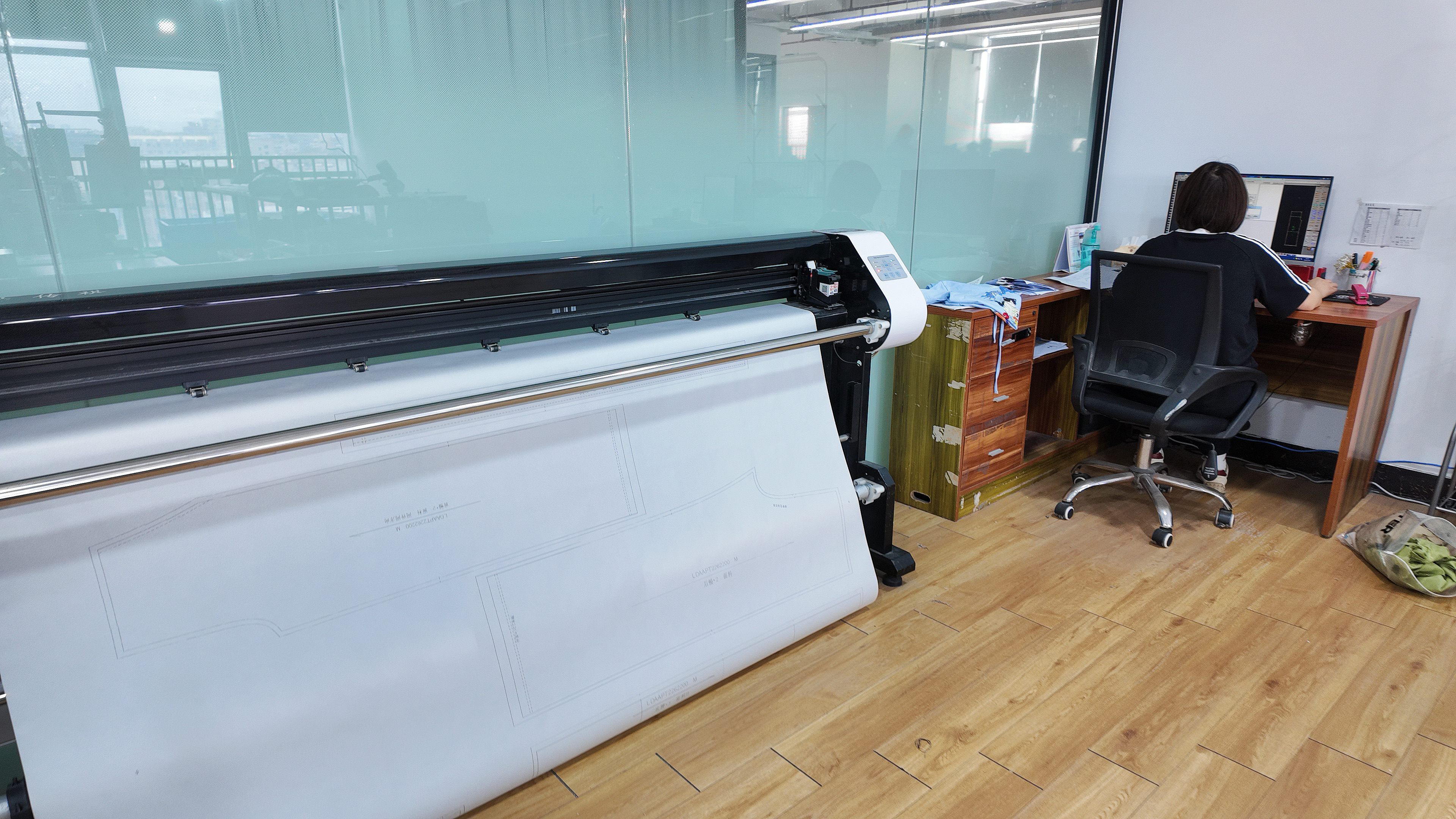 Pattern making department with CAD design at QICHENG garment factory